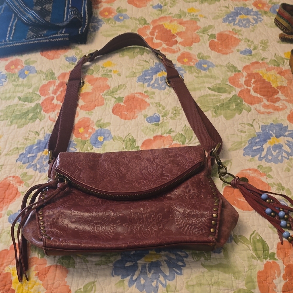 The Sak Embossed Burgandy Brown Crossbody Bag with Tassel